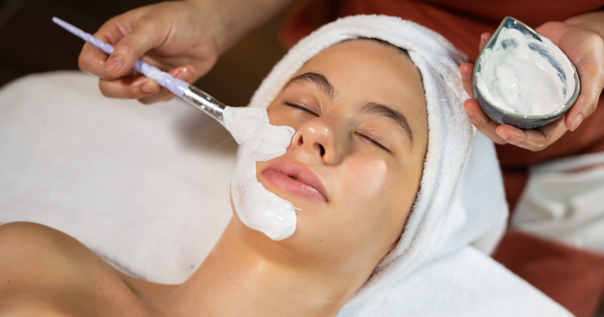 Woman receiving facial treatment in Vancouver, WA spa